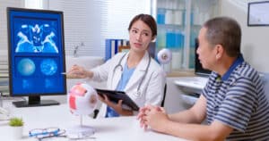 Doctor explain eye xray film to patient