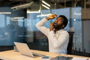 A man drips medicine drops into his dry eyes.